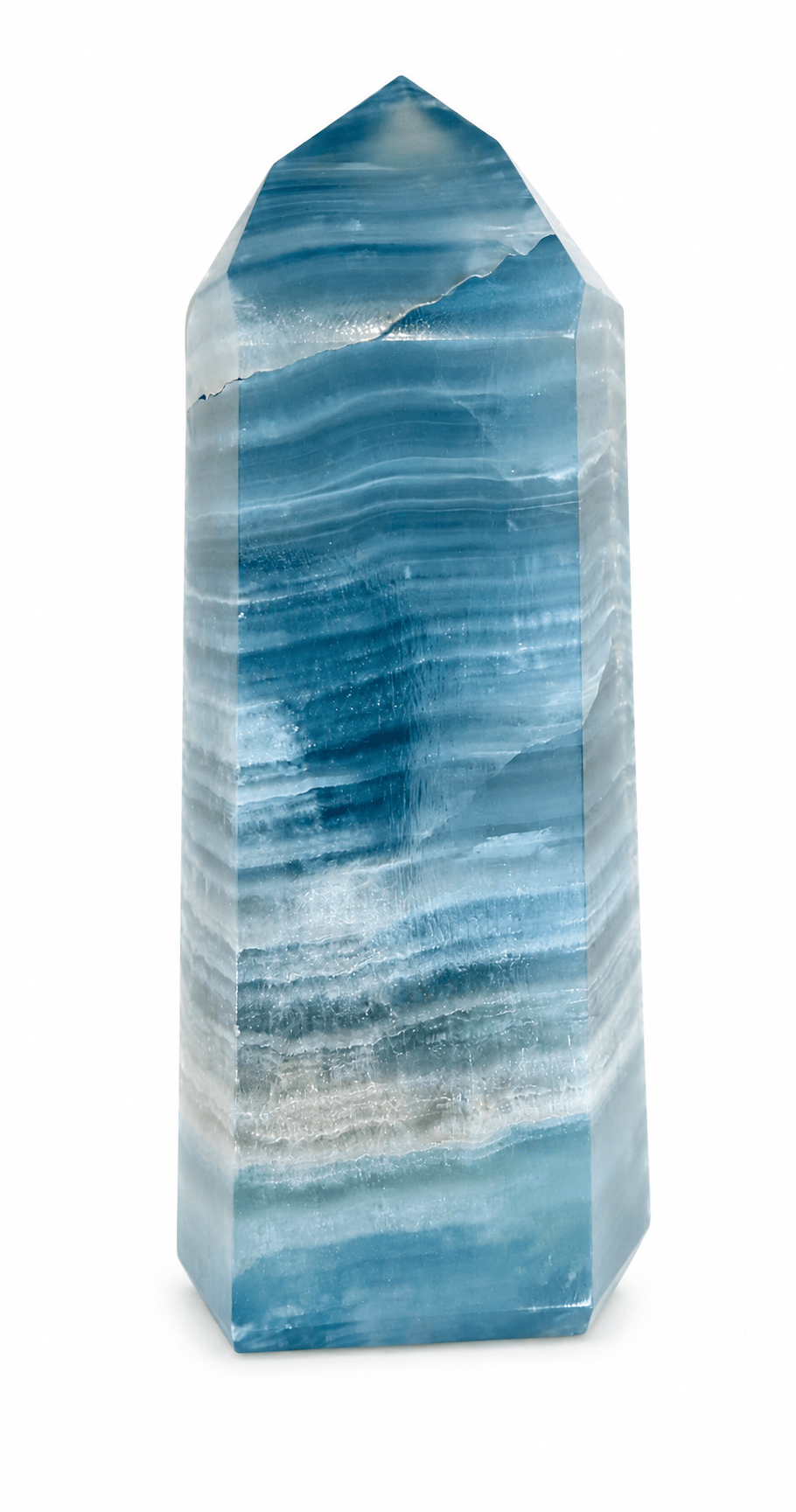 Blue onyx generator from Sacred Light Soundbaths and Crystals, showing a polished blue onyx stone with intricate natural patterns.