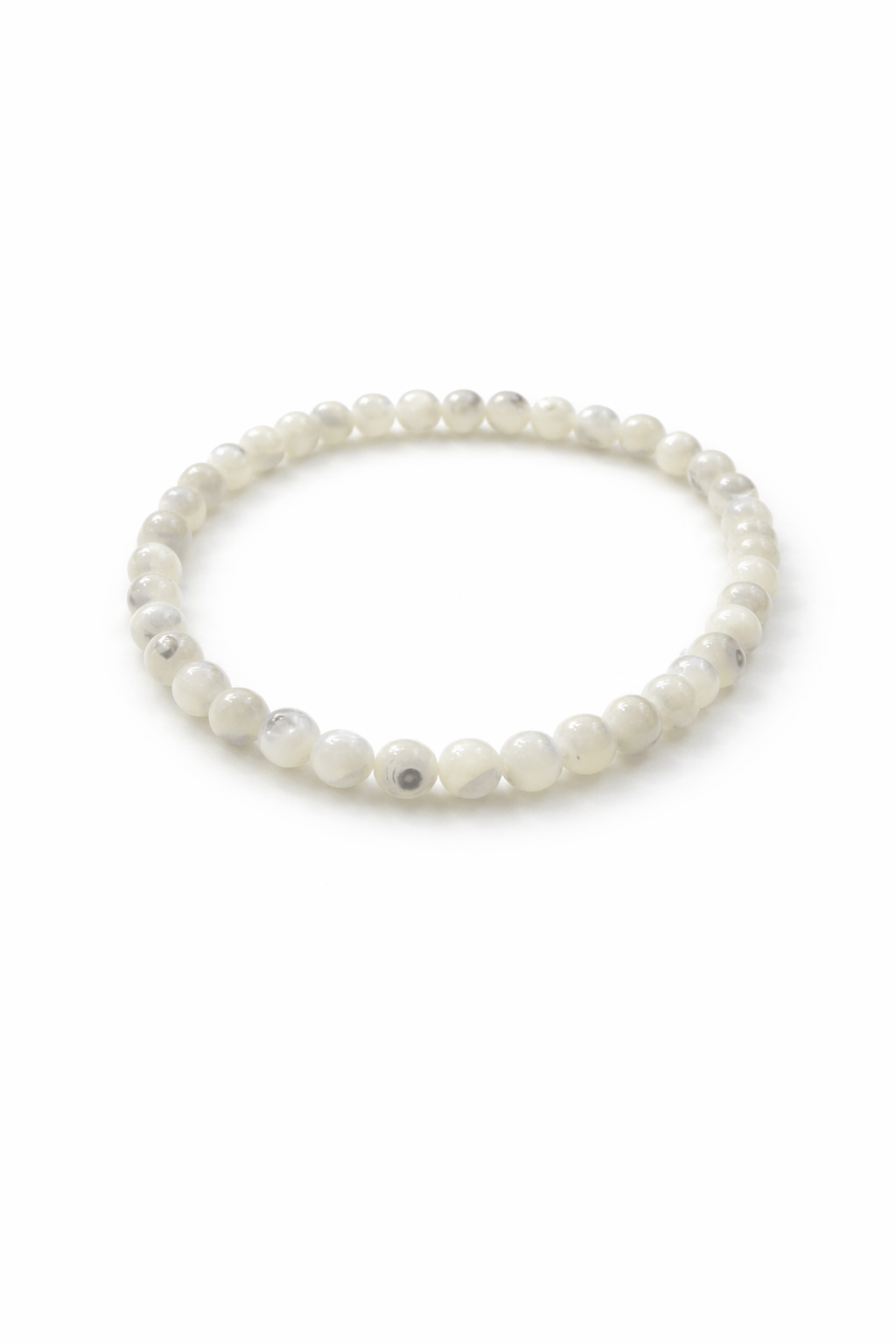 Dainty pearl bracelet by Sacred Light Soundbaths and Crystals featuring small lustrous pearls on a delicate silver chain.