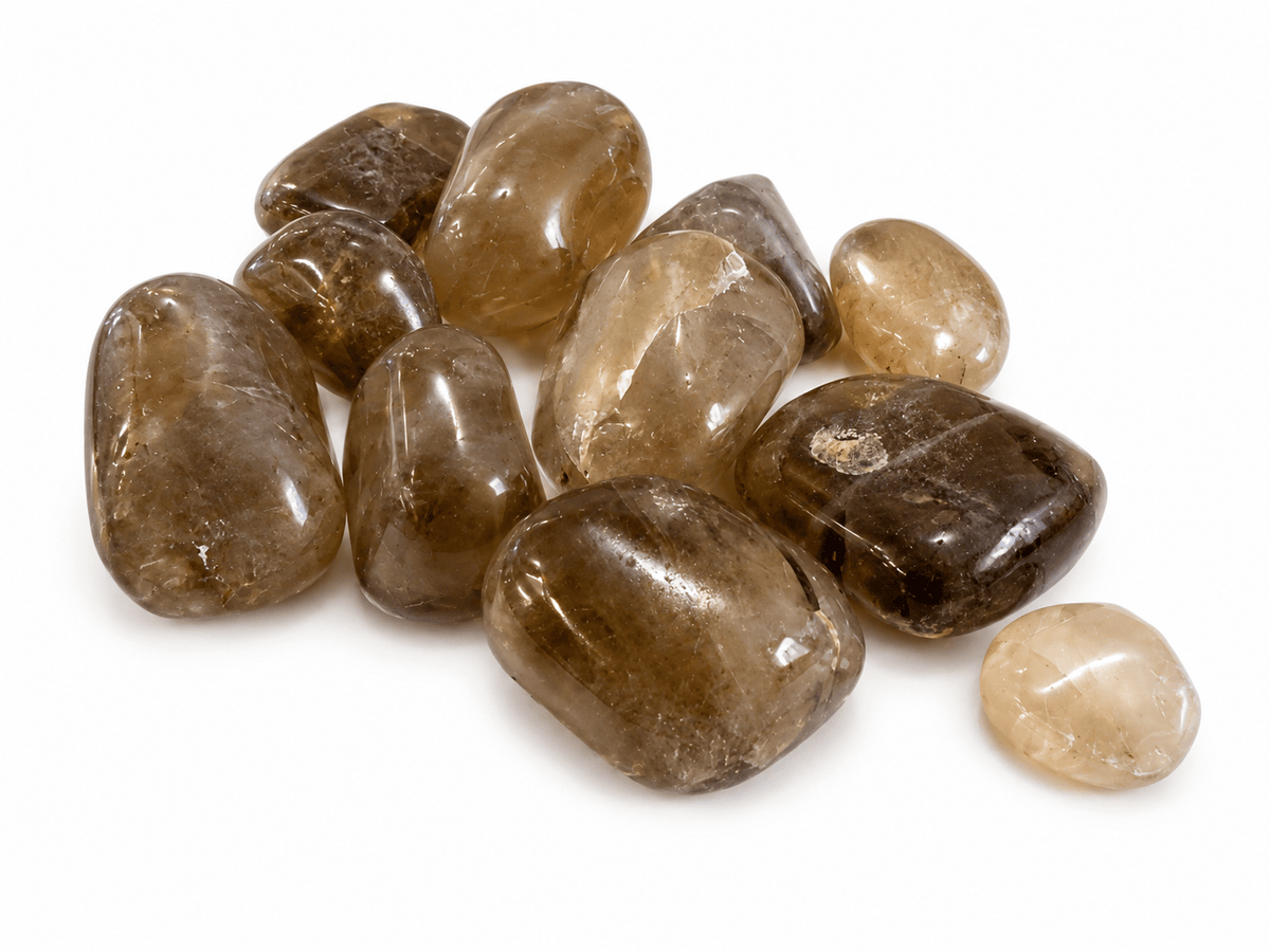 Tumbled Congo Citrine crystal from Sacred Light Soundbaths and Crystals showing its warm golden-orange hue and smooth polished surface.