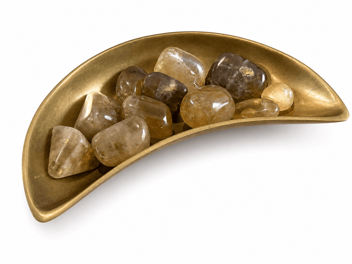 Tumbled Congo Citrine crystal from Sacred Light Soundbaths and Crystals, showcasing its warm golden-orange color and smooth polished surface.