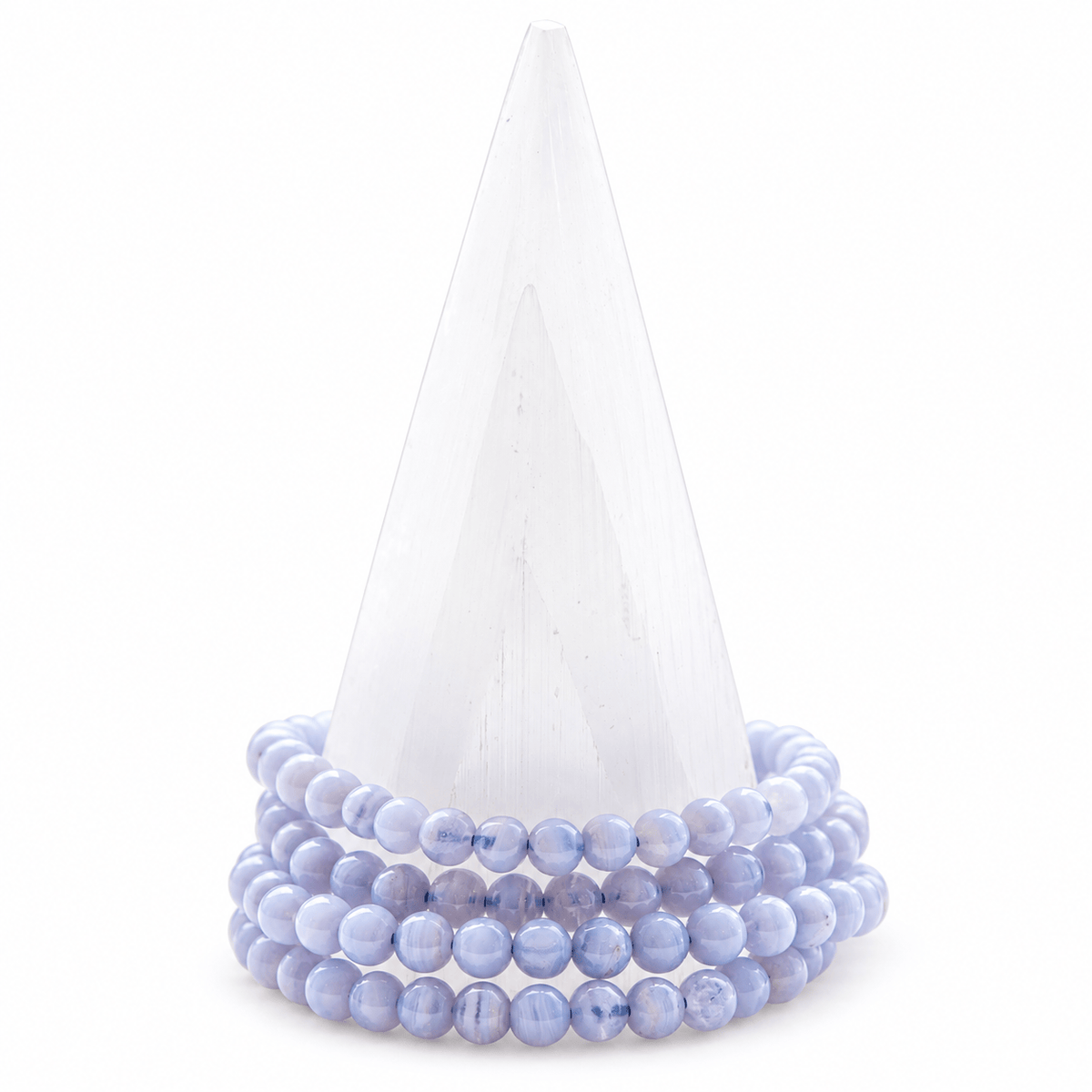 Medium blue lace agate bracelet with polished round beads from Milk and Honey, showcasing a calming, elegant accessory.