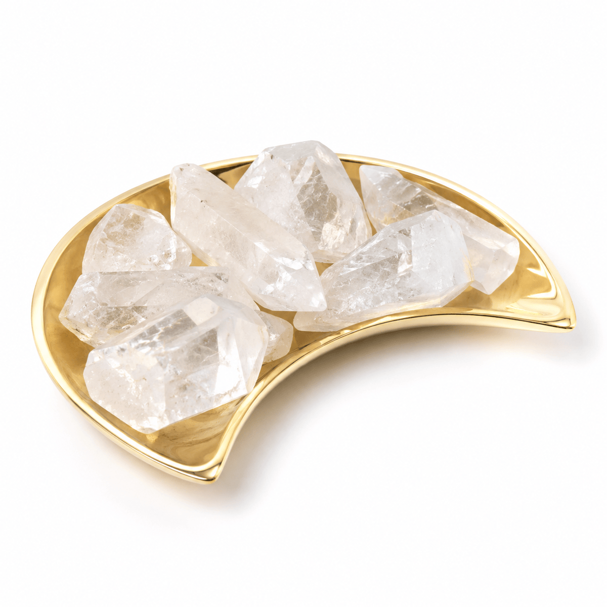 Clear Quartz Point stone from Sacred Light Soundbaths and Crystals, showcasing a transparent crystal point with natural facets.