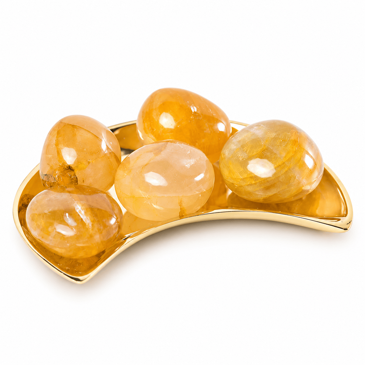 Golden Hematoid Quartz tumbled stone from Sacred Light Soundbaths and Crystals, showcasing its rich gold and red crystal formations.