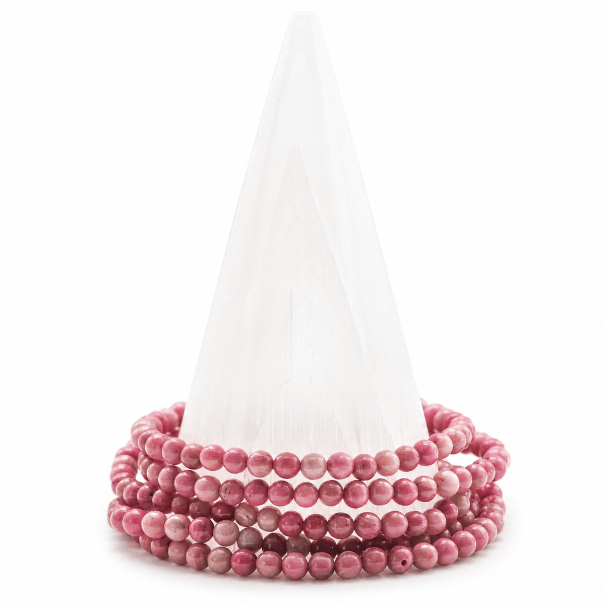 Dainty Rhodonite bracelet by Milk and Honey featuring smooth pink and black gemstone beads on a delicate jewelry chain.
