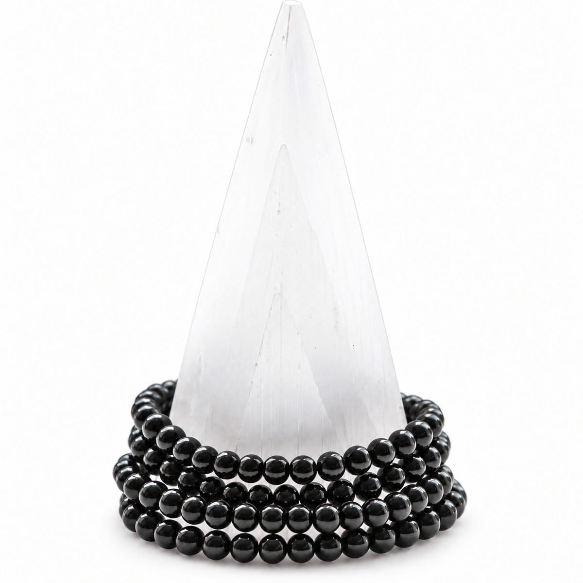 Black Tourmaline Bracelet by Milk and Honey featuring medium-sized polished tourmaline stones on a jewelry bracelet.