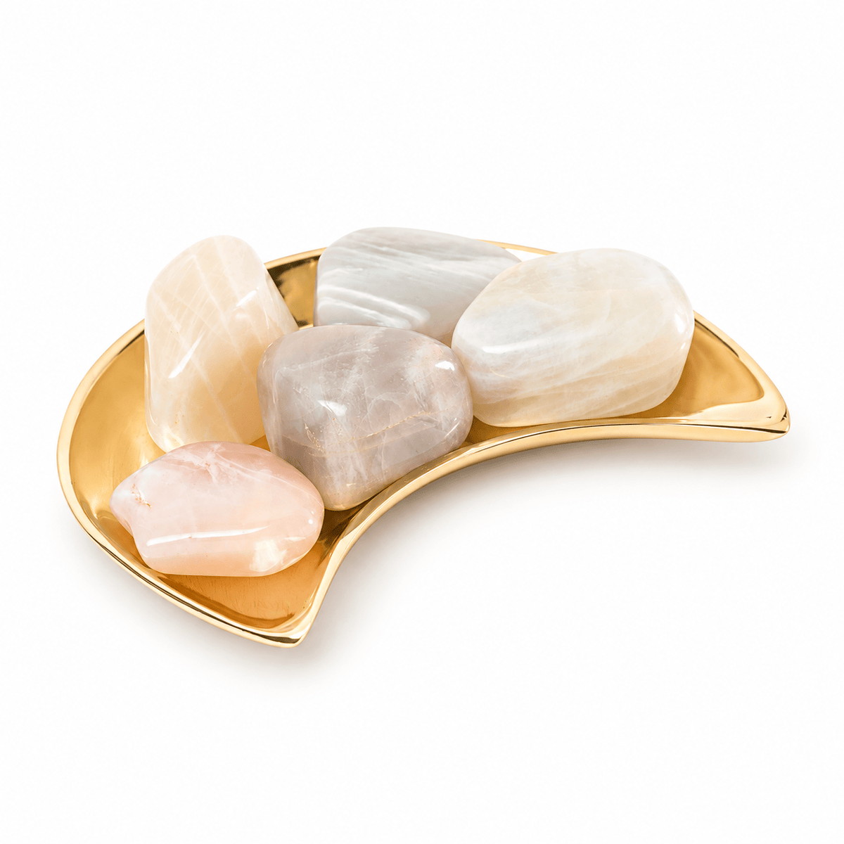 Smooth tumbled moonstone stone from Sacred Light Soundbaths and Crystals, showcasing its soft, iridescent surface.