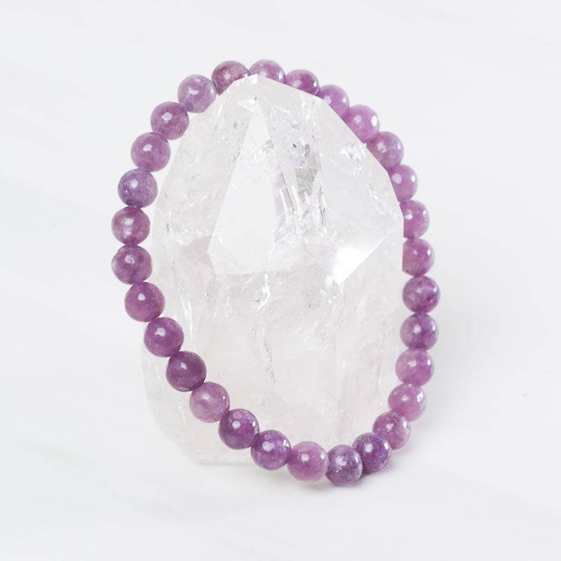 Lepidolite medium bracelet by Milk and Honey featuring polished purple stones and a flexible jewelry design.