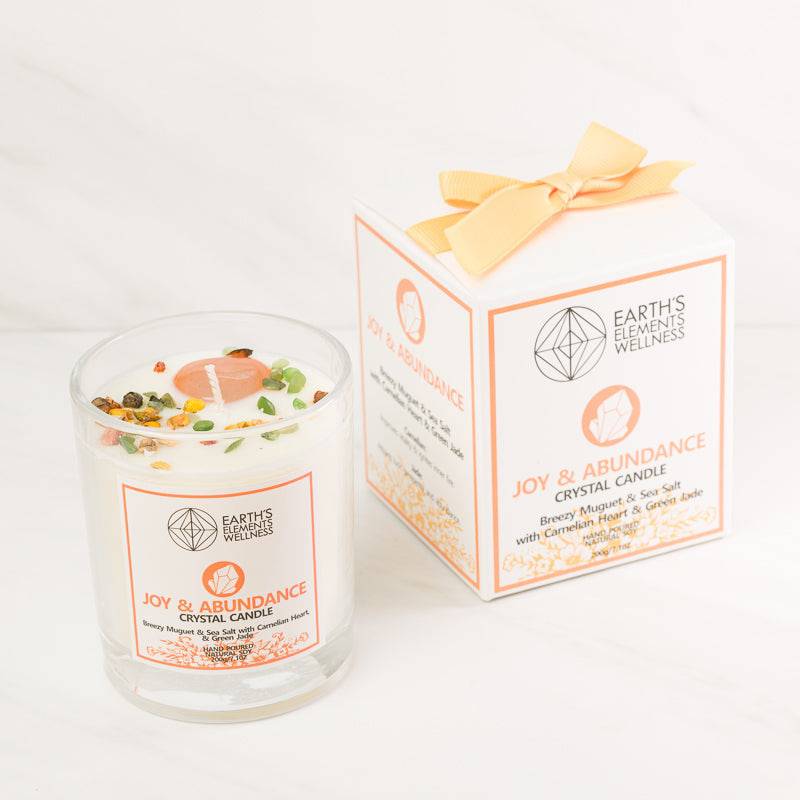 Sacred Light Soundbaths and Crystals Earth’s Elements Candle featuring a natural beeswax candle with earthy decor accents