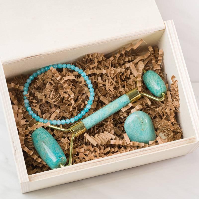 Amazonite soothing face massage roller set by Sacred Light Soundbaths and Crystals, showing the calming stone and massage accessories.