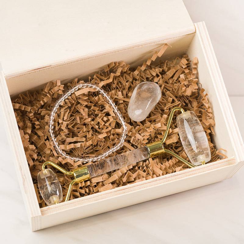 Sacred Light Soundbaths clear quartz face massage roller set with soothing accessories for facial relaxation and skincare.