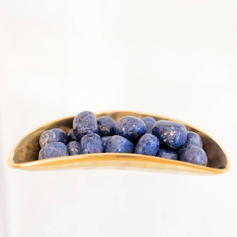 Tumbled Peruvian Dumortierite stone from Sacred Light Soundbaths and Crystals, showcasing smooth, polished blue and gray mineral stones.