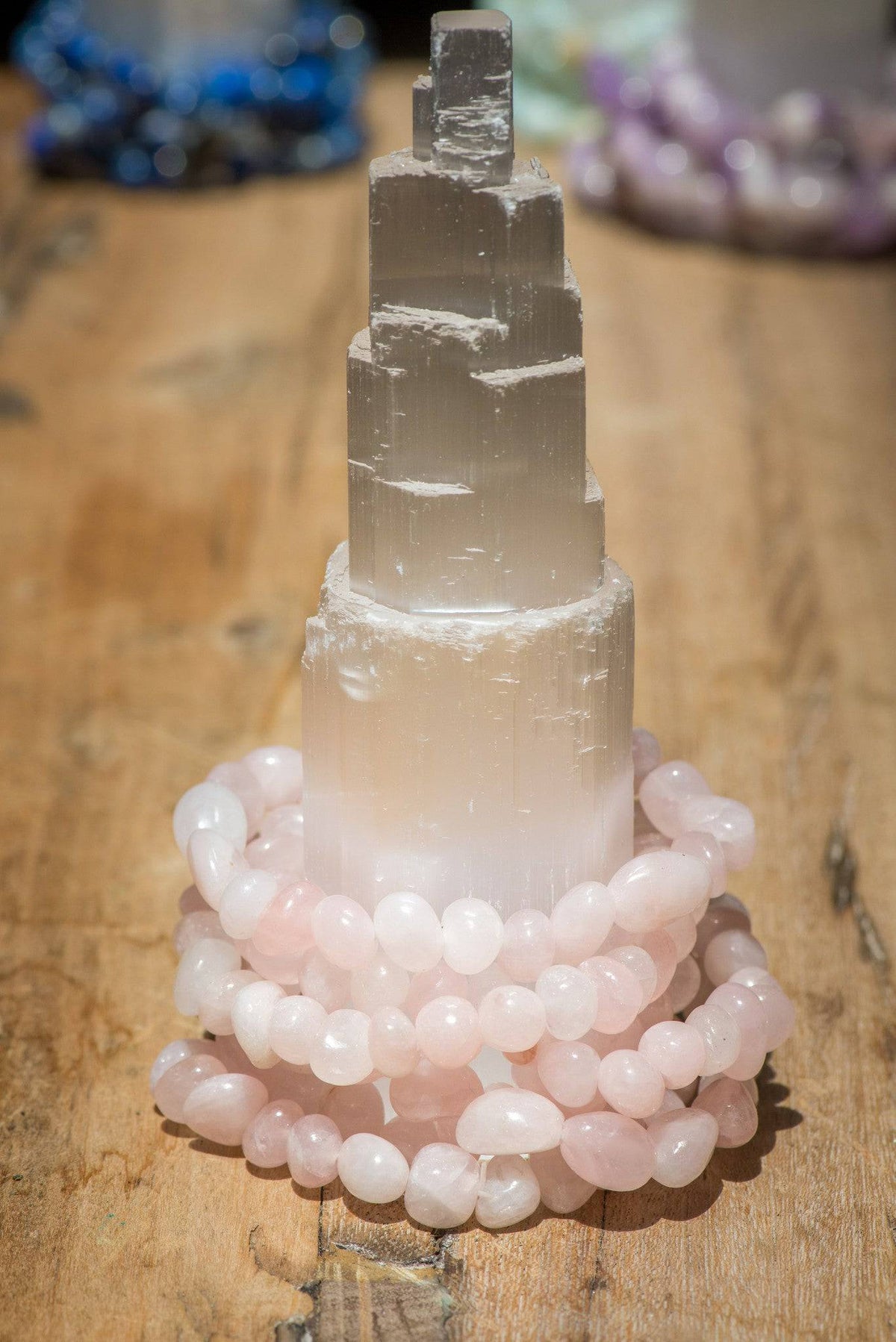 Rose quartz bracelet from Milk and Honey jewelry featuring smooth pink gemstone beads on an elastic cord.