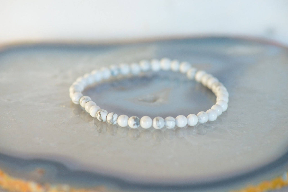 Delicate Howlite bracelet by Milk and Honey featuring smooth white beads and subtle gold accents, jewelry accessory.