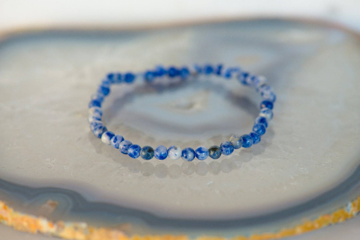 Dainty Sodalite bracelet with blue stone beads from Milk and Honey jewelry collection, displayed on a neutral background.