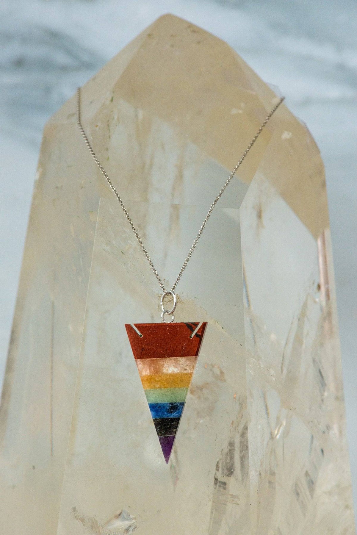 Sacred Light Soundbaths and Crystals Chakra Arrowhead Necklace featuring a polished arrowhead pendant on a beaded chain.
