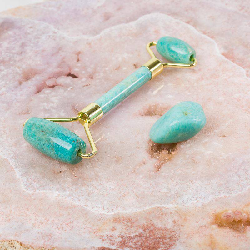 Amazonite soothing face massage roller from Sacred Light Soundbaths and Crystals, designed for facial massage and skin relaxation.