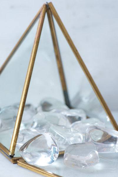 Tumbled clear quartz crystal from Sacred Light Soundbaths and Crystals, smooth transparent gemstone with natural clarity